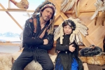 Shah Rukh Khan trolls, Native American War Bonnets, shah rukh khan and his son abram trolled for sporting native american war bonnets, Trifle