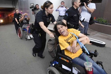 Denver Police arrest disabled protestors at Sen. Gardner's Office